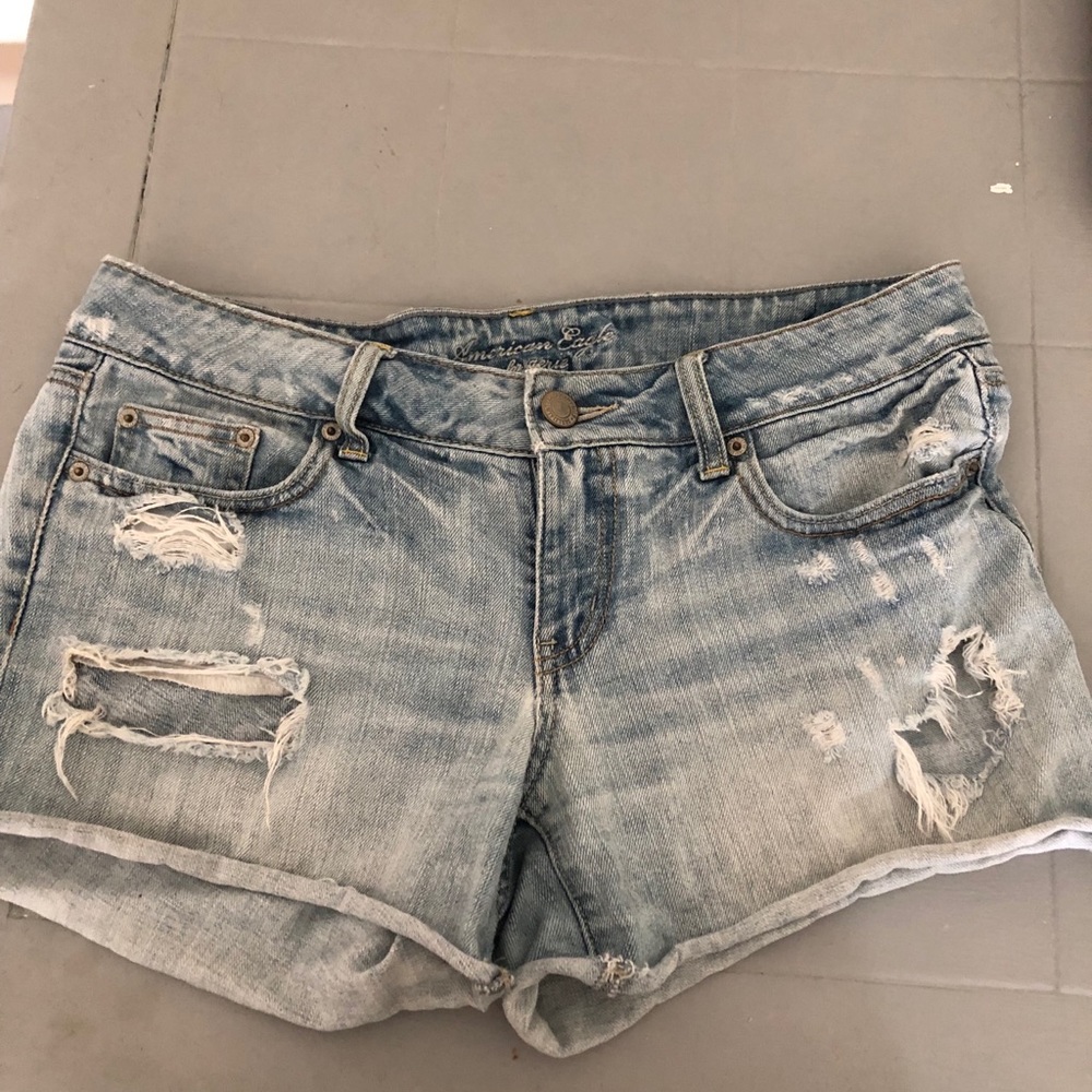 Distressed light wash denim shorts